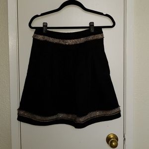 EUC BCBGMaxAzria Pleated Black Skirt with Gold Trim